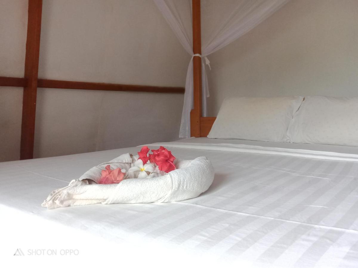 We'Be Cottages Gili Meno Esterno foto